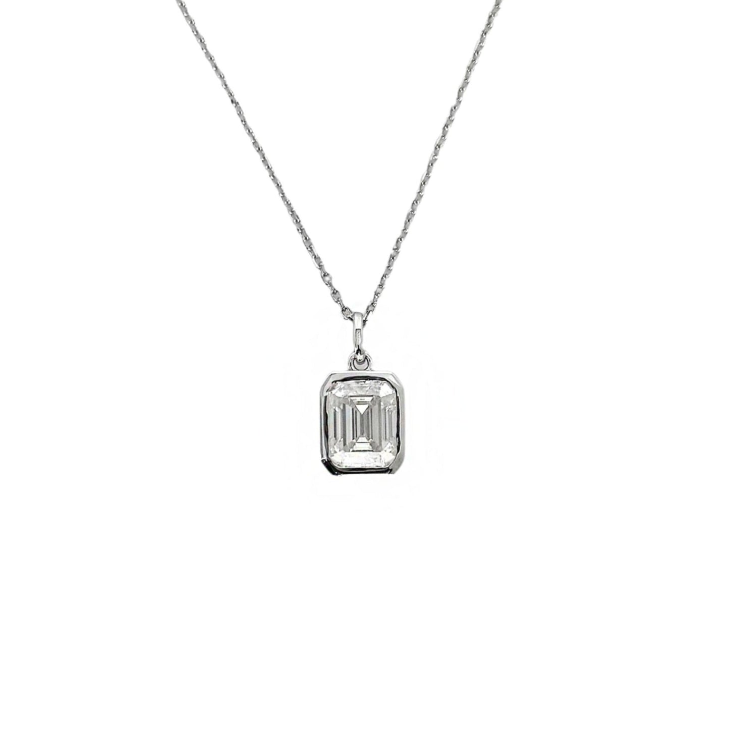 Silver necklace with a rectangular pendant on a white background